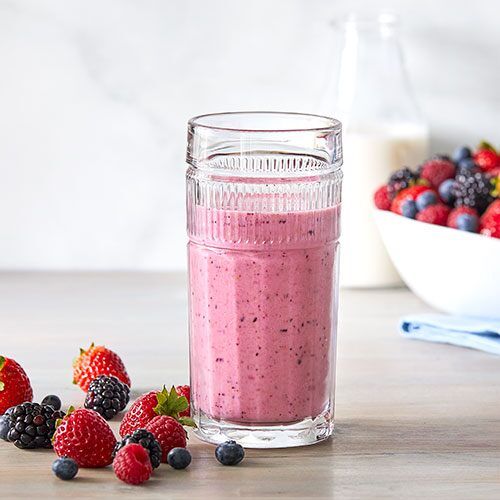 Mixed berries blended with Greek yogurt, almond milk, and a little bit ...