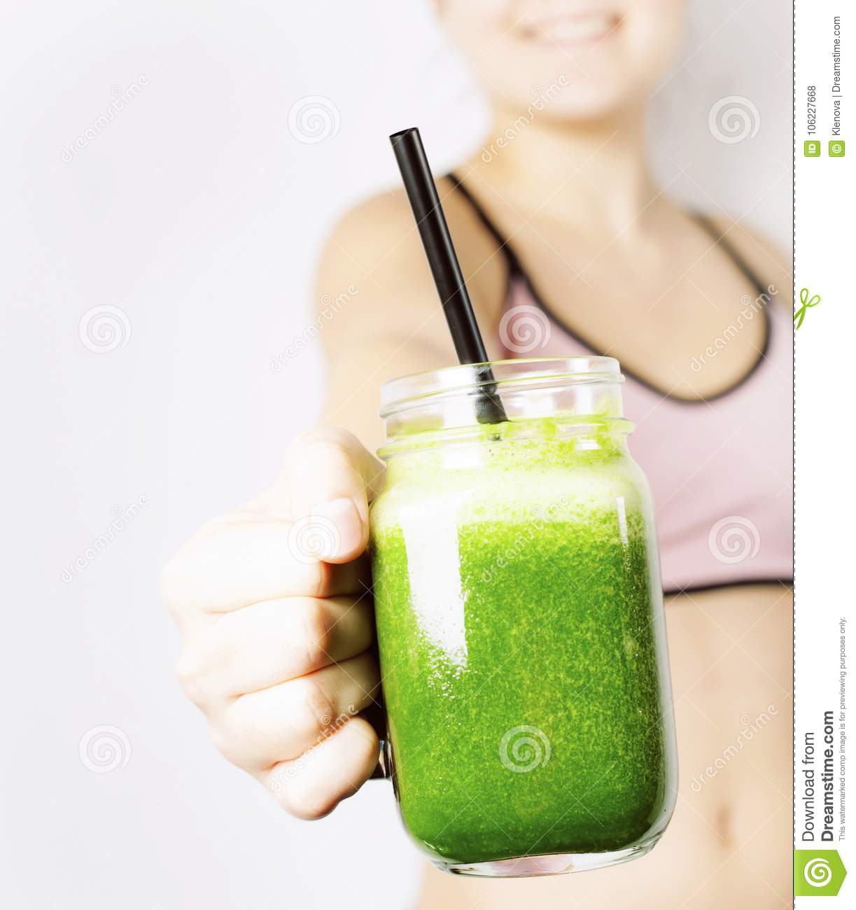 Teenage Girl with Green Smoothie Stock Photo